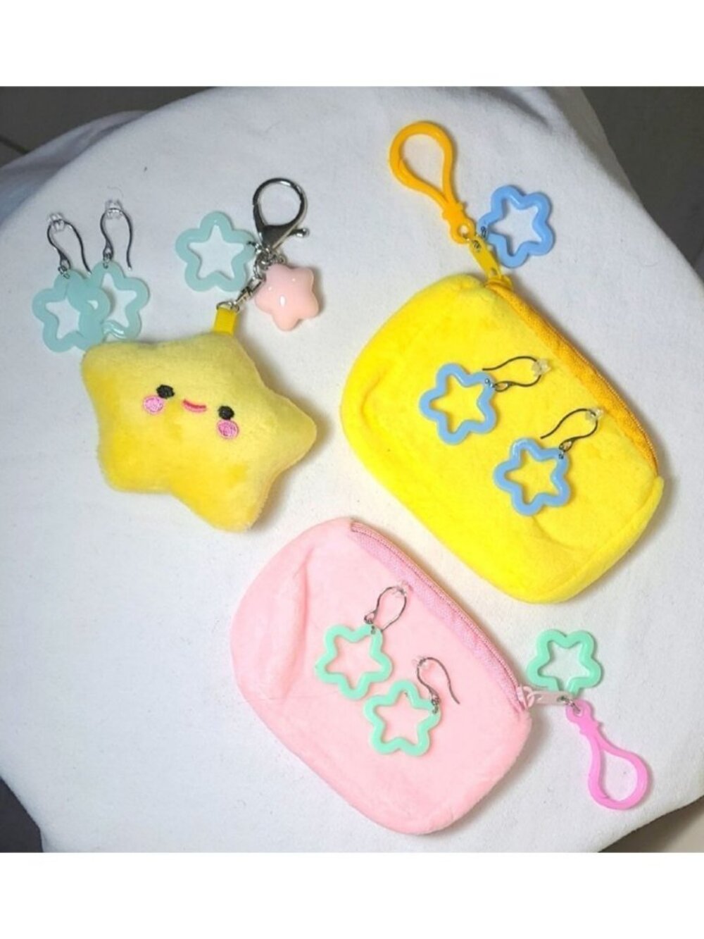 Rave festival earrings & bags, binkies, plush bag charms.